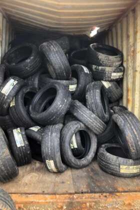 AMSA Yang Ming container full of tyres