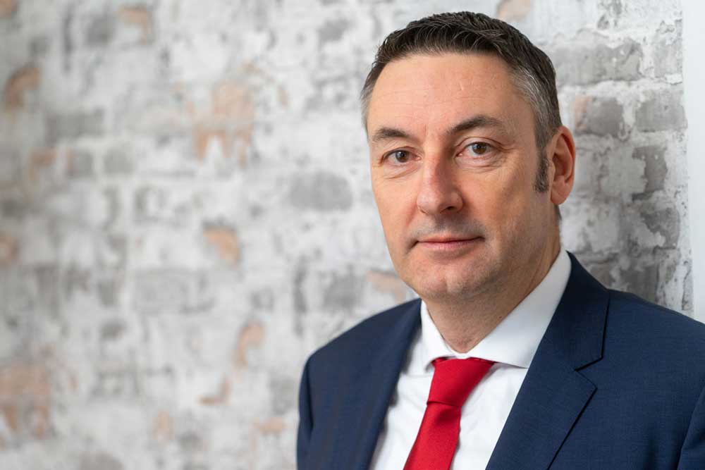 Jan Schwarz, Vertriebsleiter der Lübecker Hafen-Gesellschaft; Mann im Anzug